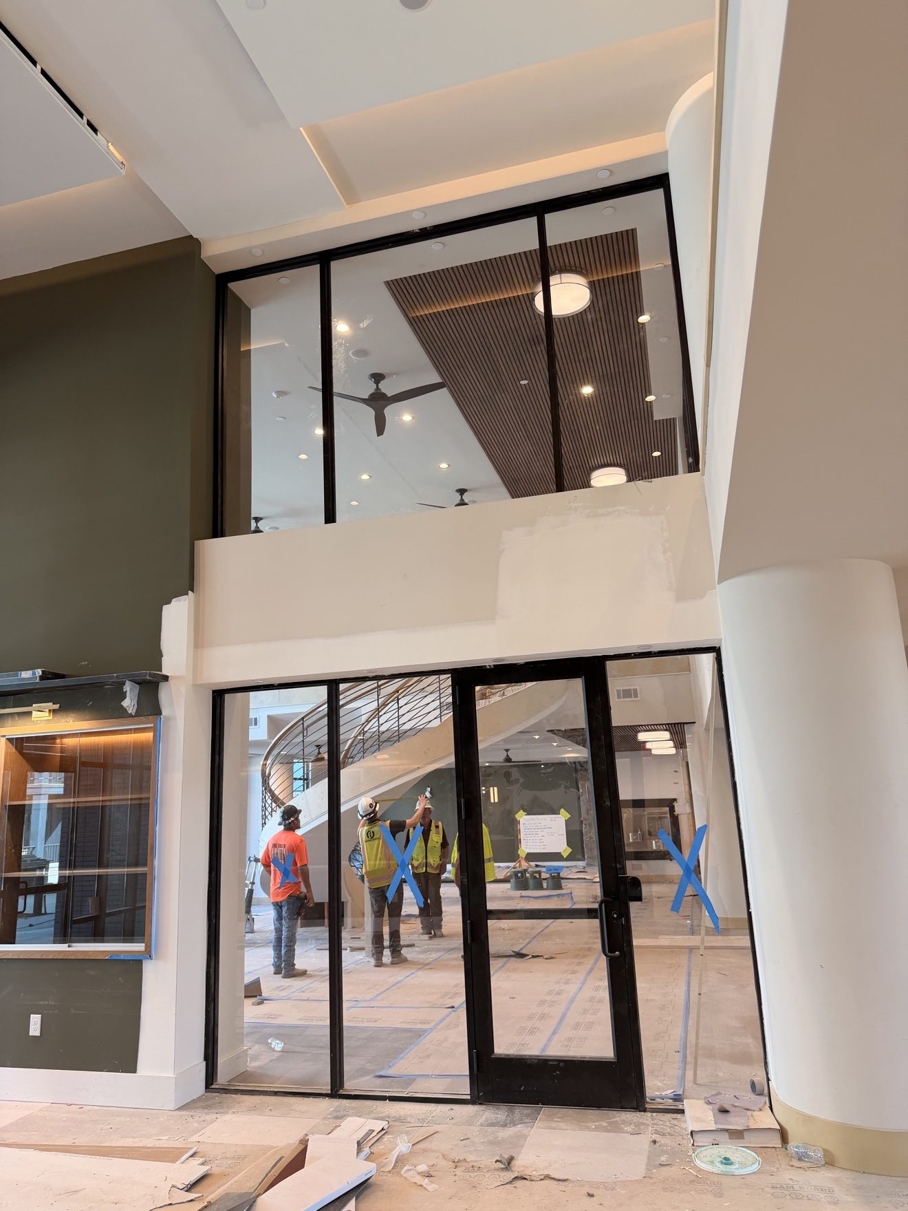 Interior glass doors — crew at work